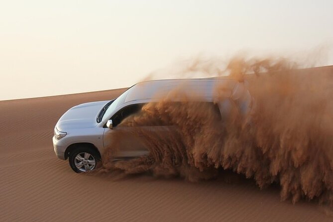 High Red Dunes Thrilling Desert Safari Sand Boarding BBQ Dinner - Sandboarding gives you a second way to use the dunes