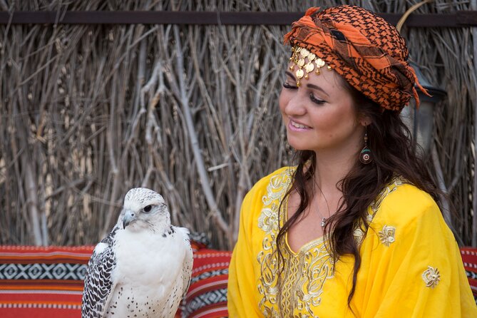 High Red Dunes with Camel Ride, Sandboarding, Falcon Show and VIP BBQ Dinner - Henna, Coffee, and Camp Activities