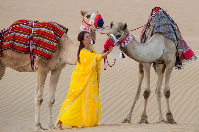 High Red Dunes with Camel Ride, Sandboarding, Falcon Show and VIP BBQ Dinner - Belly Dance, Tanoura, and the Evening Program