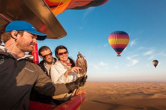 Hot Air Balloon Sunrise Tour with free transport in Dubai - Breakfast, camel rides, and the falcon photograph