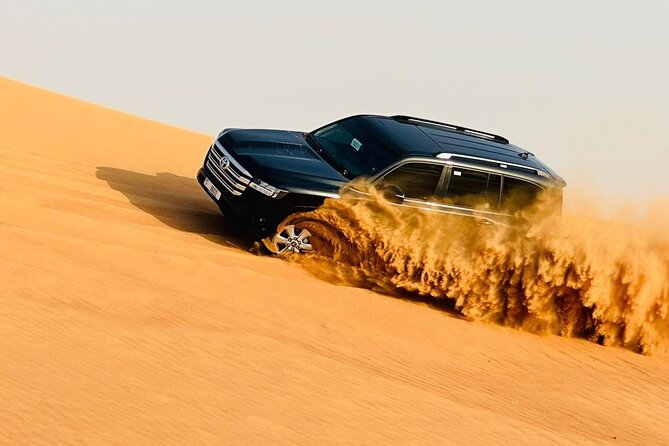 Morning Desert Safari, Quad Bike, Dunes Bashing and Camel Ride - Sandboarding offers easy fun at the dunes