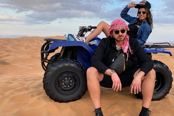 Morning Desert Safari, Quad Bike, Sandboard and Camel Ride - Camel feeding at a traditional farm