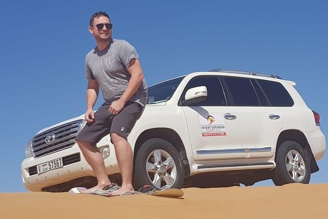 Morning Desert Safari with Camel Ride and Sandboarding - Sandboarding on the Lahbab Dunes