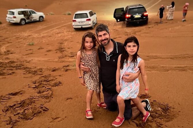 Morning Desert Safari With Quad Biking and Sandboarding - A camel ride and a quiet pause
