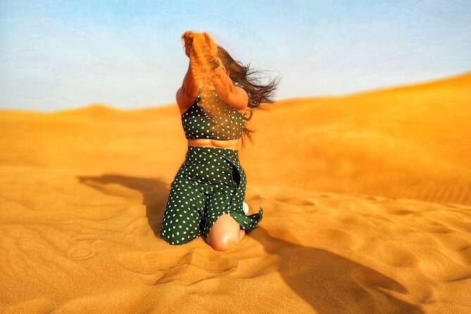 Morning Desert Safari with Sandboarding & Camel Ride on Red Dunes - Dune bashing in the high red dunes