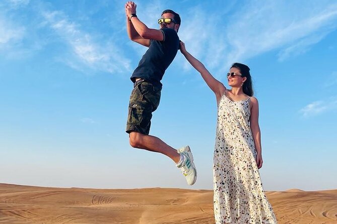 Morning Desert Safari with Sandboarding & Camel Ride on Red Dunes - Desert views, photos, and the falcon stop