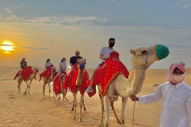 Morning Desert Safari with Sandboarding & Camel Ride on Red Dunes - Pickup in an air-conditioned 4x4