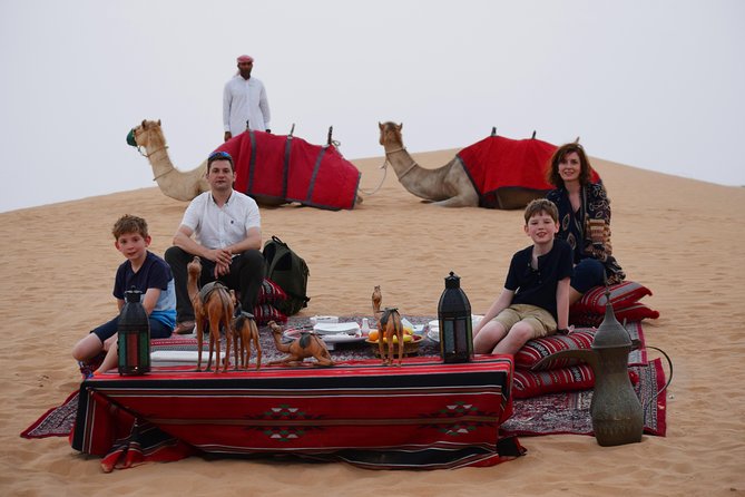 Morning Dubai Desert Safari with Camel Ride & Sand boarding - Falconry and the human side of the tour