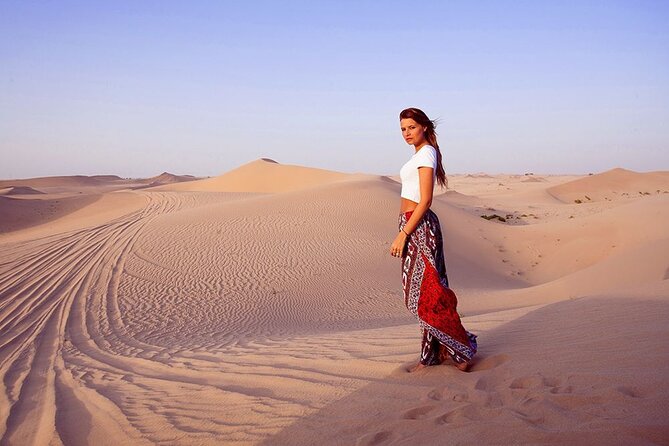 Morning Dune Bashing with Camel Trekking and sand boarding - Riding out to the red sands of Lahbab