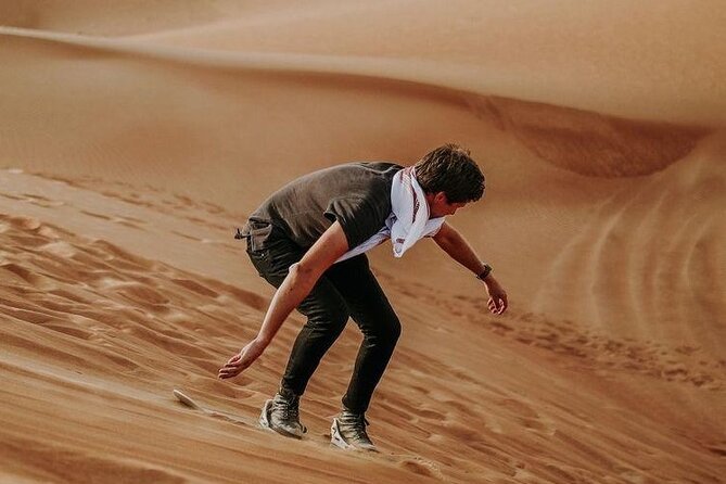 Morning Quad Biking & Red Sand Desert Safari , Camel Ride, Sand Boarding - Sandboarding is easy to try, harder to master