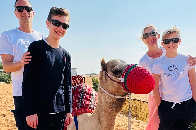 Morning Red Dune Safari with Sandboarding and Camel Ride - Sandboarding on Lahbab’s red dunes