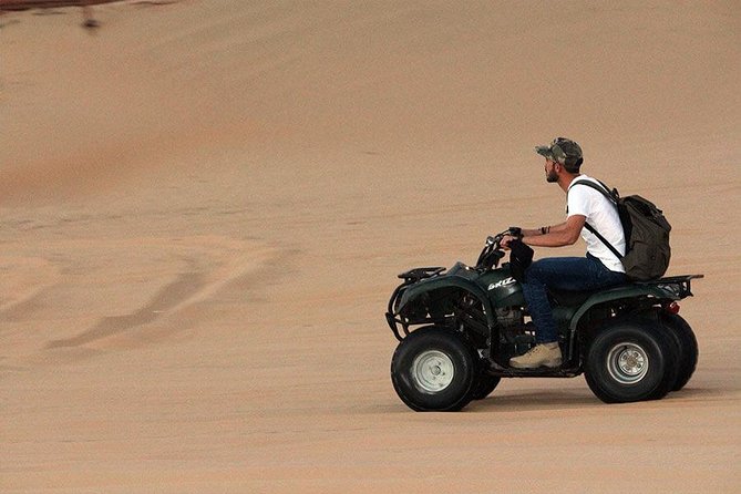 Morning Red Dunes Safari: Quad Biking, Sandboarding & Camel Ride - Quad biking in the designated area