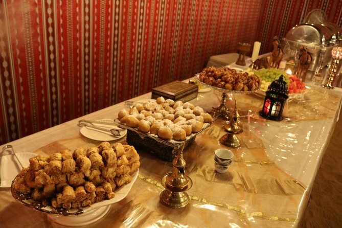 One hour Quad Bike at Red Sand Desert Safari with Camel Ride and BBQ Dinner - Who should book this experience?