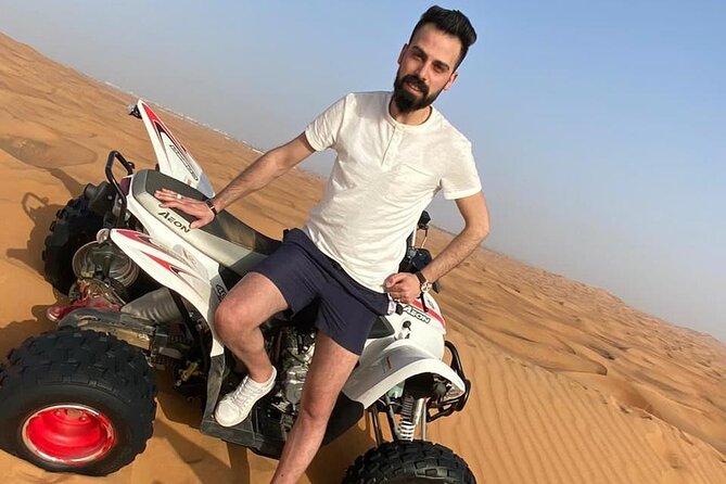 One hour Quad Bike at Red Sand Desert Safari with Camel Ride and BBQ Dinner - Getting to the Red Sands from Dubai or Sharjah