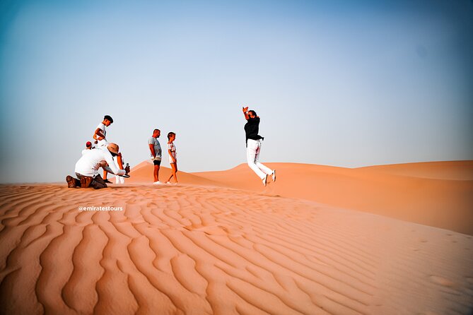 Overnight Desert Safari with BBQ Dinner & Breakfast Abu Dhabi - Camp activities: camel rides, sand boarding, and henna