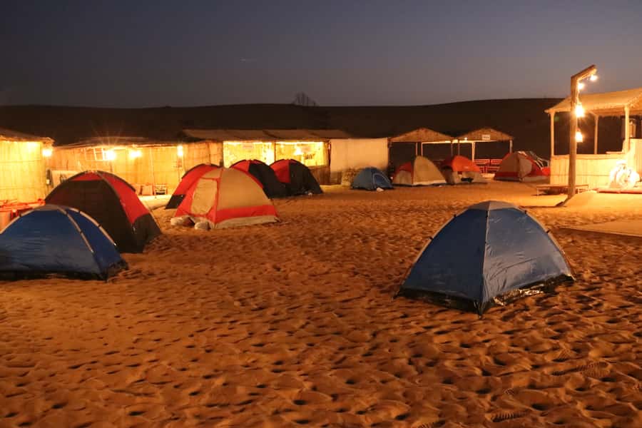 Overnight Dubai Desert Safari with BBQ Dinner - Dune Driving and Sandboarding