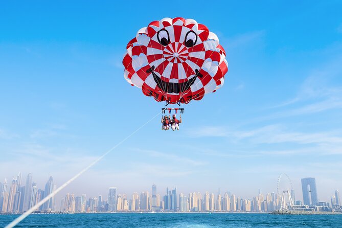 Parasailing in Dubai with Palm Jumeirah and JBR Beach views - Dubai parasailing at a glance