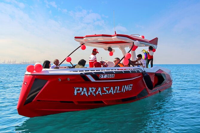 Parasailing in Dubai with Palm Jumeirah and JBR Beach views - Starting at Dubai Harbour near the International Marine Club