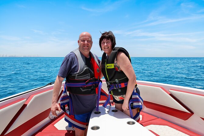 Parasailing in Dubai with Palm Jumeirah and JBR Beach views - Smooth landing, photos, and the return to the harbour