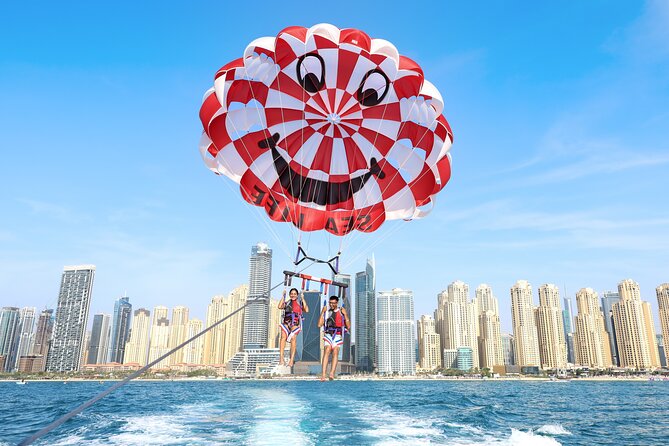 Parasailing in Dubai with Palm Jumeirah and JBR Beach views - Safety, weather, and the limits you should know