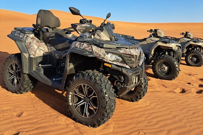 Polaris 570cc (4x4 )Quad Bike Ride +Sand Boarding- Red Dunes - Pickup from Dubai or Sharjah sets the tone