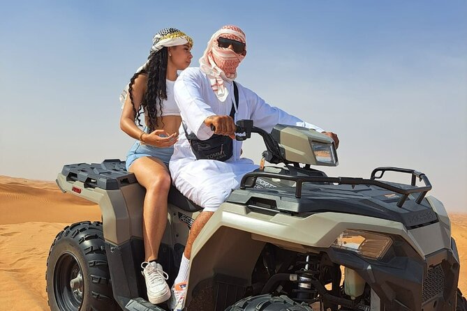 Polaris 570cc (4x4 )Quad Bike Ride +Sand Boarding- Red Dunes - One hour across Dubai’s red dunes