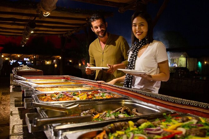 Premium Desert Safari Dubai : Dune Bashing, Camel Ride with BBQ - Sandboarding, photos, and the sunset stop