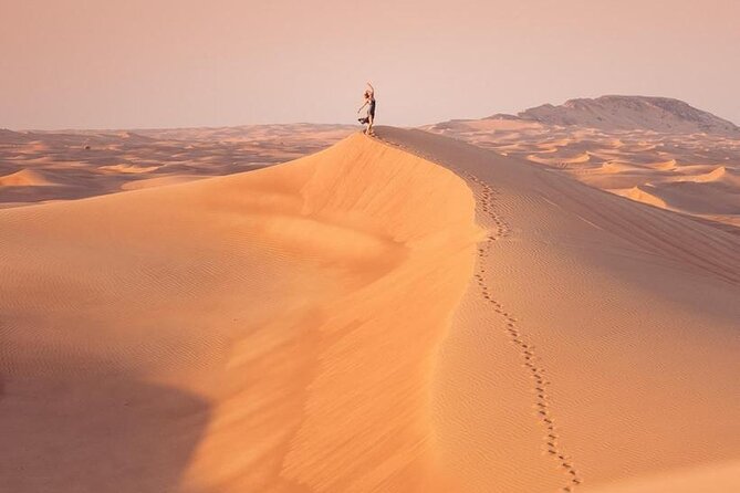 Premium Desert safari With Dune buggy camel ride BBQ dinner - Sandboarding at the Desert Edge