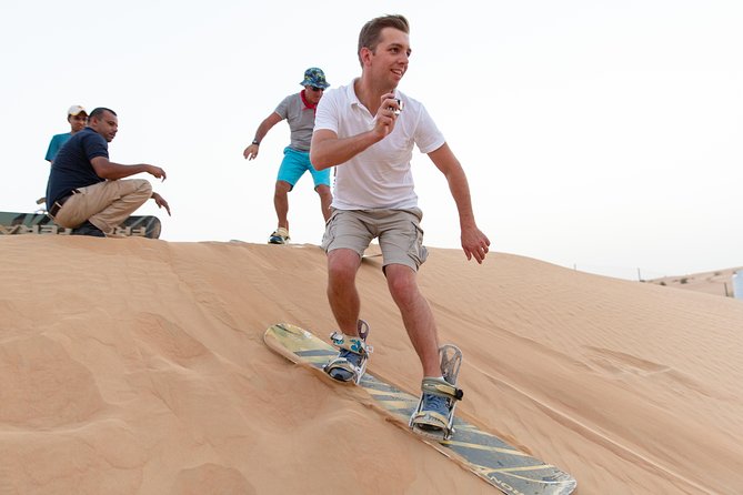Premium Dubai Desert Safari with BBQ Dinner in the Red Dunes - Leaving Dubai behind in an air-conditioned 4x4