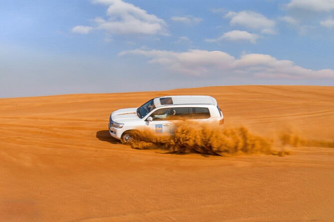 Premium Red Dune Safari with Camel Ride and BBQ in Arabian camp - From Dubai pickup to Lahbab’s red dunes