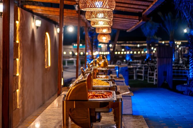 Premium Red Dune Safari with Camel Ride and BBQ in Arabian camp - Camel ride and sandboarding