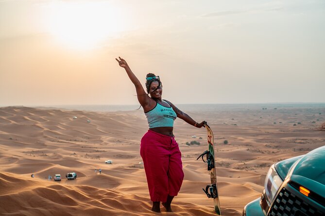 Premium Red Dune Safari with Camel Ride and BBQ in Arabian camp - Dune bashing in a 4WD
