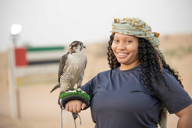Premium Red Dunes Bashing with Quad Bike, Camel, Falcon &VIP Camp - Falcon photos and sunset in Lahbab