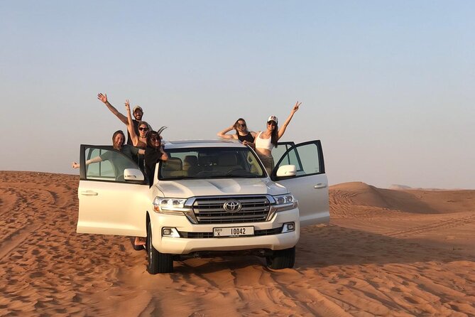 Private Desert Adventure –Dune Bashing, Dinner& Live Performances - Sunset over the Arabian Desert