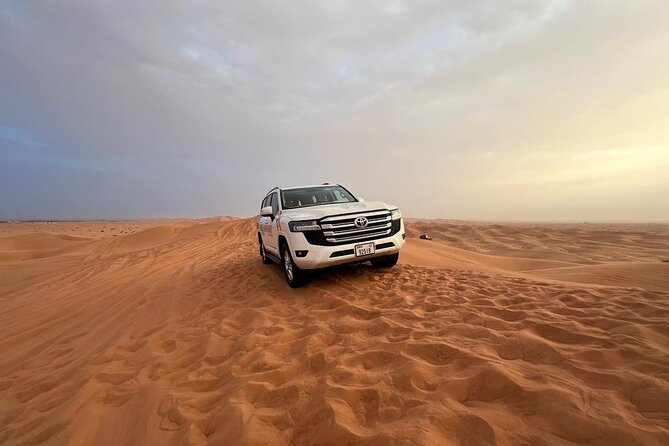 Private Desert Safari Dubai Tour With Dune Bashing and BBQ Dinner - Tire pressure drops before the red dunes