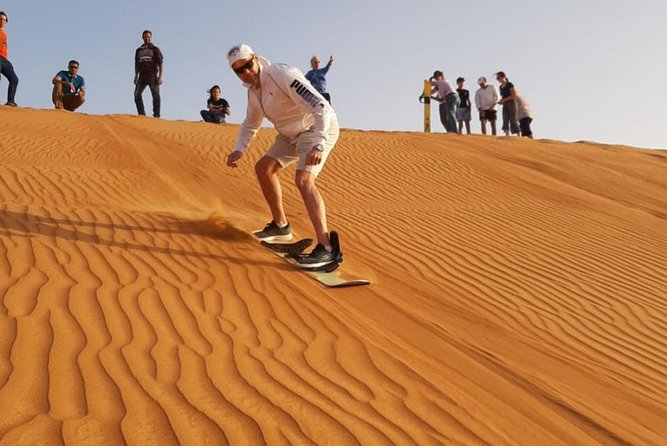 Private Desert Safari Red Dune with BBQ, Sand Boarding and Camel Ride - Sunset on the open dunes