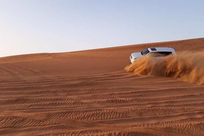 Private Desert Safari Red Dune with BBQ, Sand Boarding and Camel Ride - BBQ dinner and the evening shows