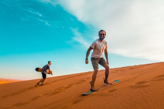 Private Desert Safari With BBQ Buffet Dinner And Live Shows - Sandboarding and the short camel ride