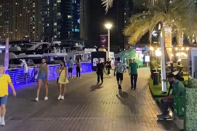 Private Dubai At Night Layover City Tour with Guide - Burj Al Arab and Jumeirah Beach begin the evening