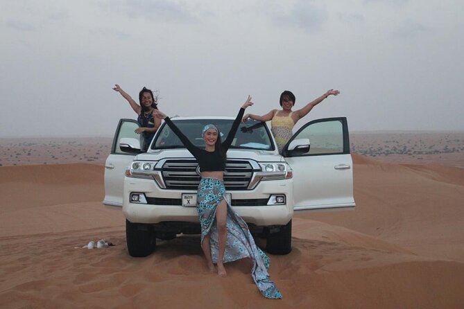 Private Evening Desert Safari Dubai with Camel Riding & BBQ - Sunset photographs and sandboarding