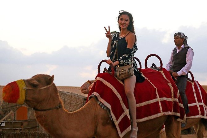 Private Evening Desert Safari: Sandboarding Camel Ride BBQ Dinner - The Al Awir camp shifts the pace