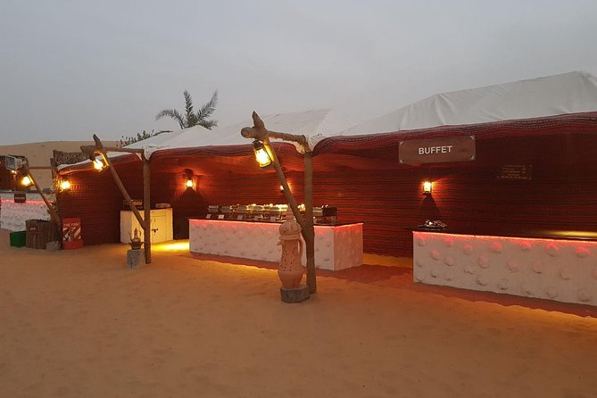 Private Evening Desert Safari with BBQ Dinner Dubai - Sandboarding on the dunes