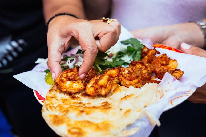 PRIVATE Food Tour: The 10 Tastings of Dubai With Locals - Crossing to the Textile Souk