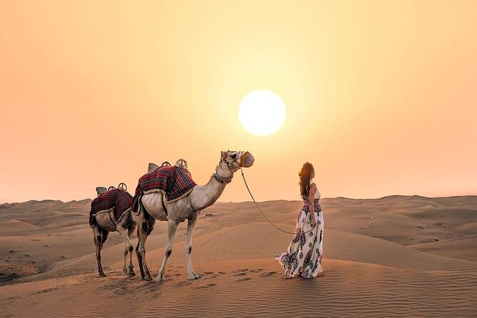 Private Morning Desert Safari: Camel Ride, Sandboarding Adventure - Sandboarding on soft desert dunes