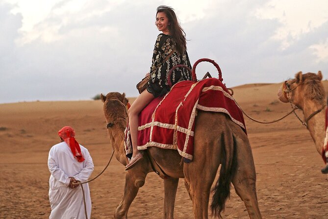 Private Morning Desert Safari with Camel Ride & Sandboarding - Sandboarding and photographs on the dunes