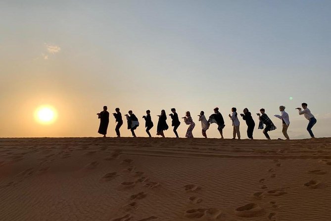 Private Morning Desert Safari with CamelRide & Sand Boarding - Camel riding and falcon photography