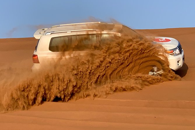 Private Red Dunes Desert Safari , BBQ Dinner and Camel ride - Dinner at a shared camp