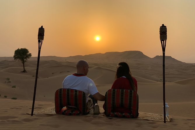 Private Red Dunes Desert Safari , BBQ Dinner and Camel ride - Tanoura dancing, fire, and belly dancing
