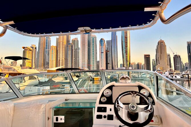 Private Small-Group Dubai Marina Boat Tour - A speedboat, not a floating viewing platform