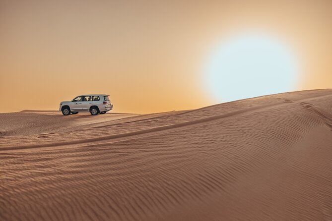 Private Sunset Desert Safari:SandSurfing, Camel Ride & BBQ dinner - Thirty minutes of Red Dune dune bashing